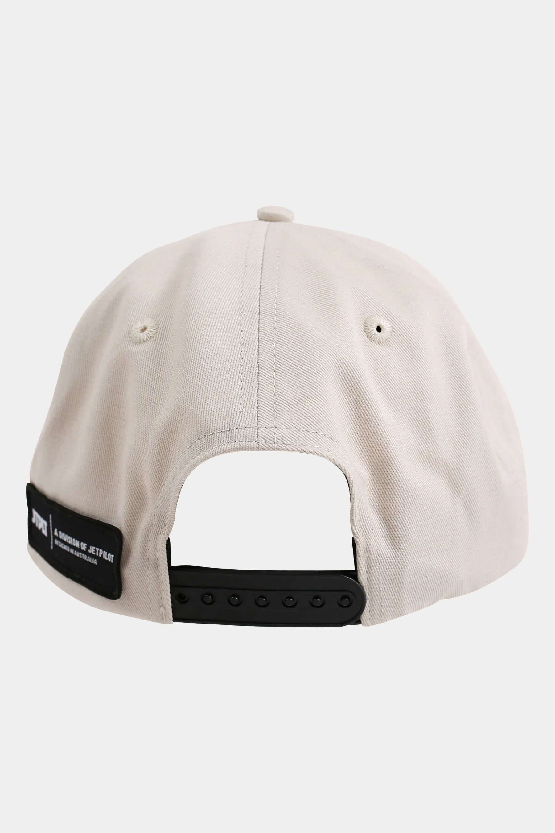 Beige cap with a black patch on a white background