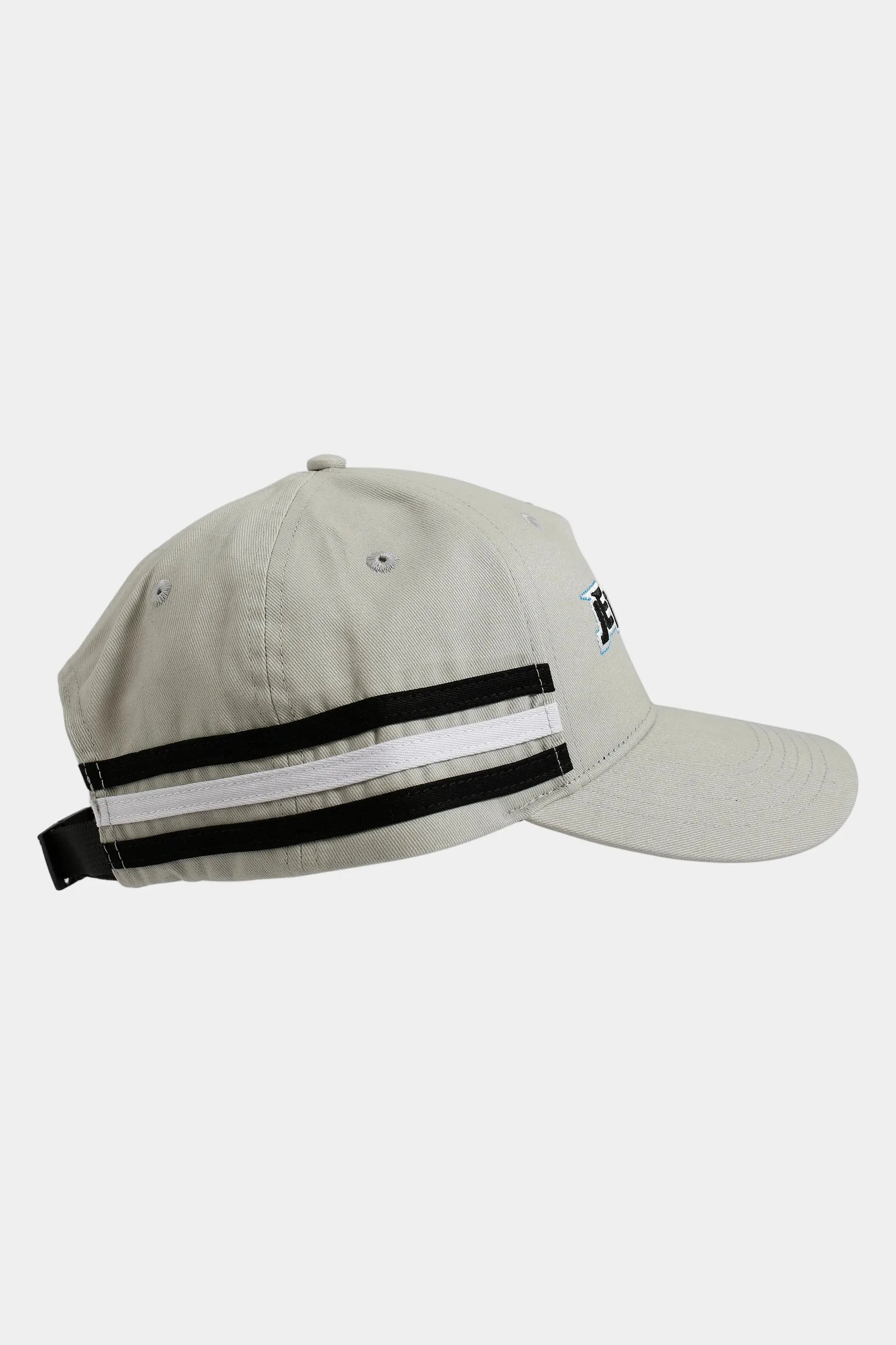 Beige cap with black and white stripes on a white background