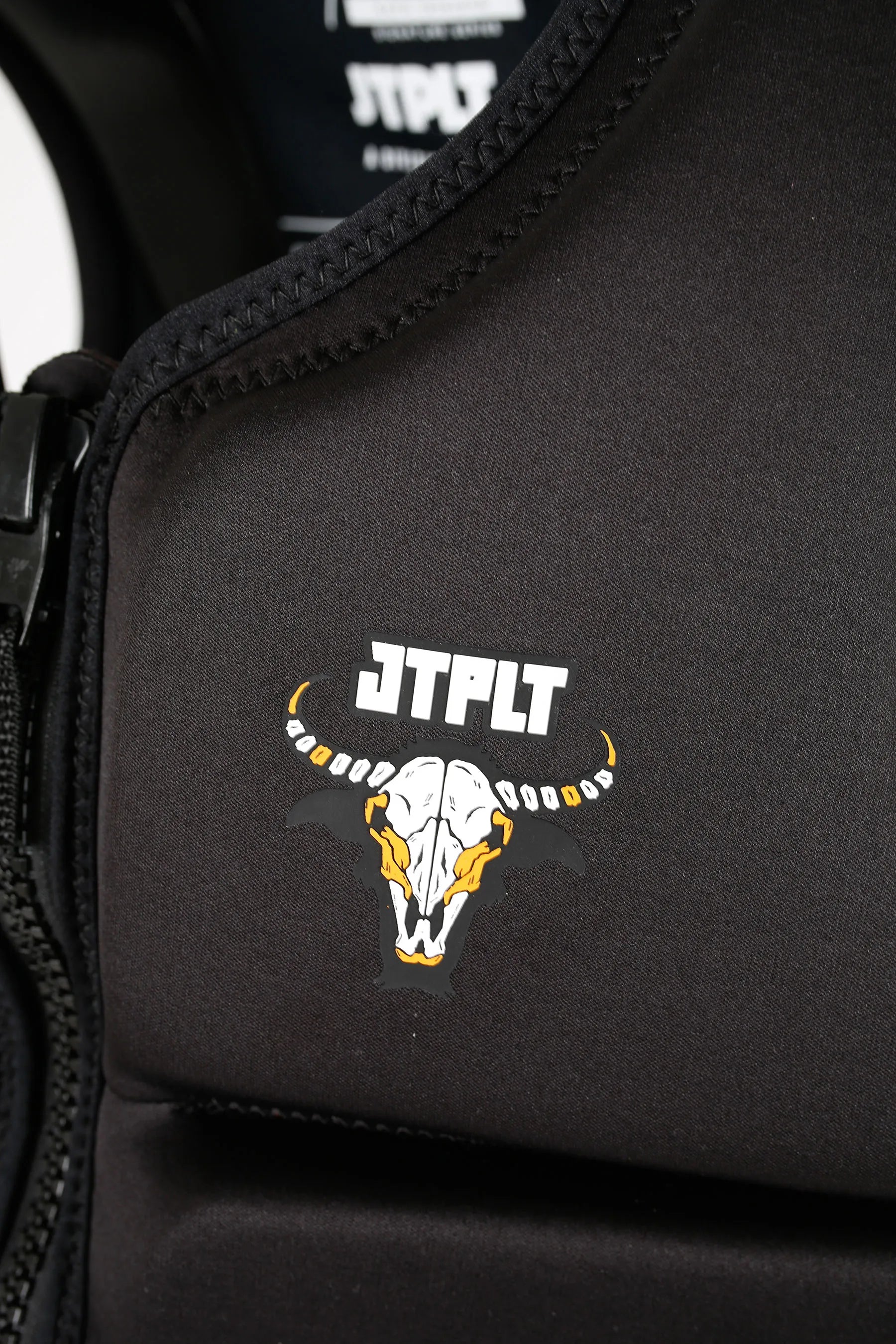 Jetpilot X1 Life Jacket - Raph Trinidad Signature Series  - Black with a logo featuring a skull and 'JTPLT' text on a dark background