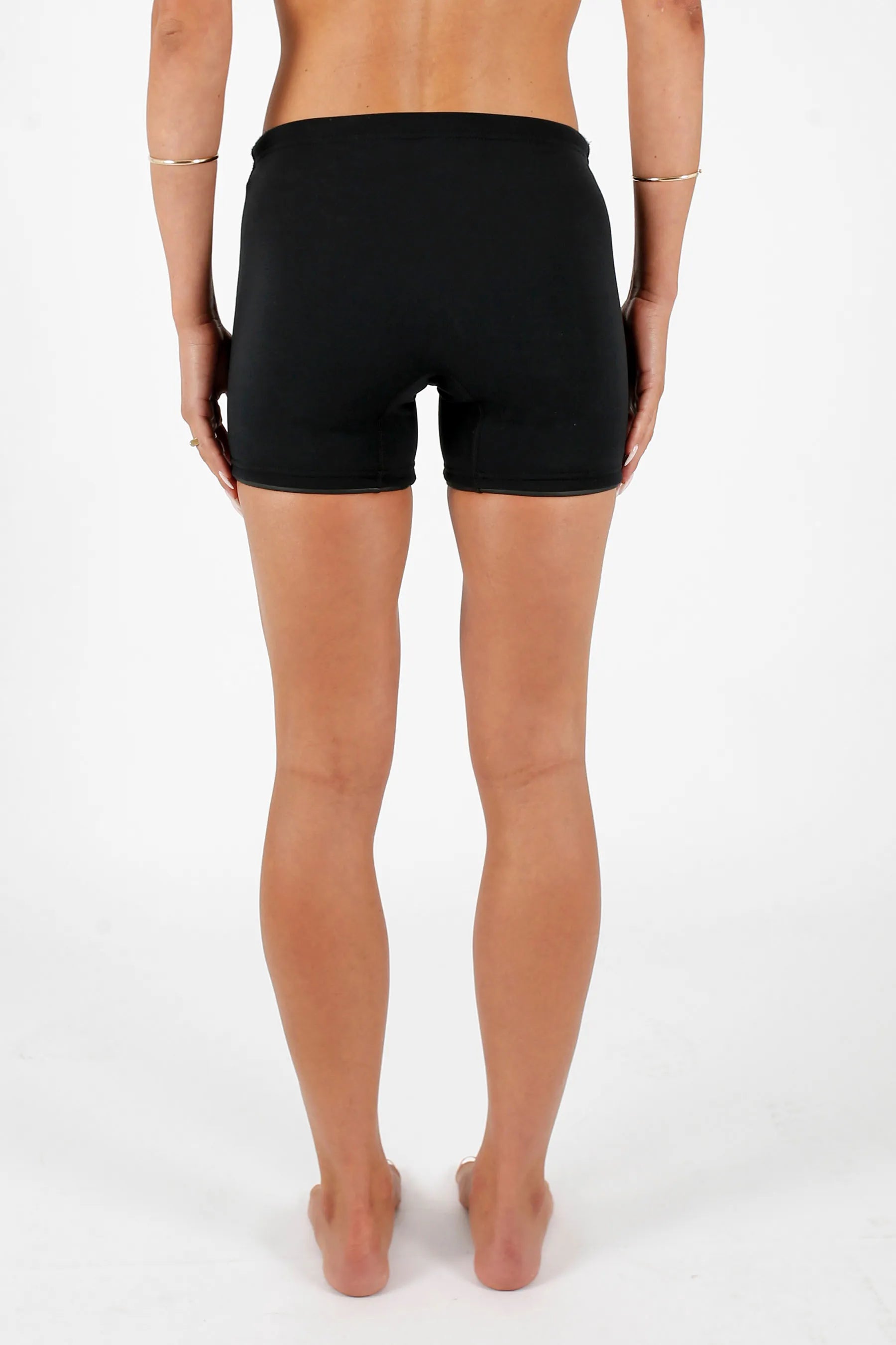 Person wearingJetpilot Corp 5" Neoprene Short - Black on a white background